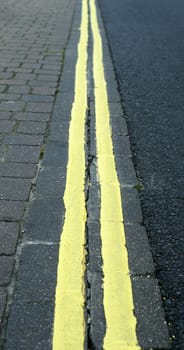 double yellow line dissapering into the distance