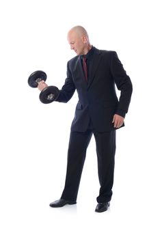 Man is suit lifting a weight concept of strength and power