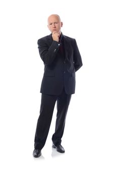 Man in suit thinking isolated on white background