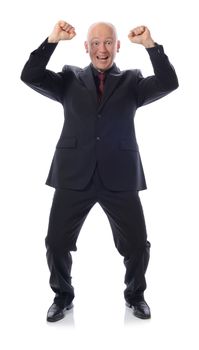 man in suit winning with arms in the air isolated on white