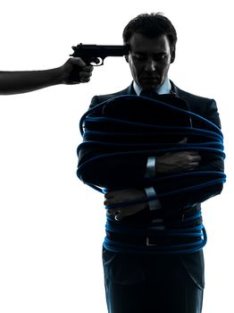captive hostage business man  in silhouette studio isolated on white background