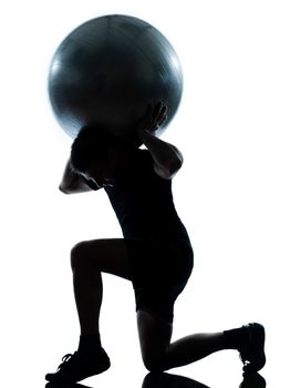 one n man workout holding fitness ball exercising workout aerobic fitness posture full length silhouette on studio isolated on white background