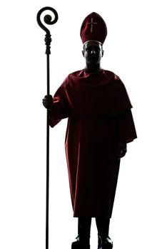 one man cardinal bishop silhouette in studio isolated on white background