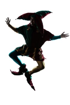 one caucasian man in jester costume jumping silhouette in studio isolated on white background
