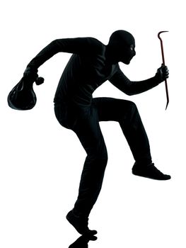 thief criminal walking quiet in silhouette studio isolated on white background
