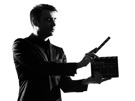 silhouette caucasian business man  with clapboard  full length on studio isolated white background