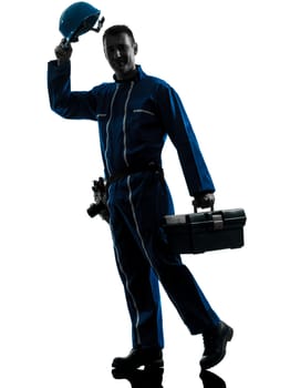 one caucasian repairman worker saluting silhouette in studio on white background
