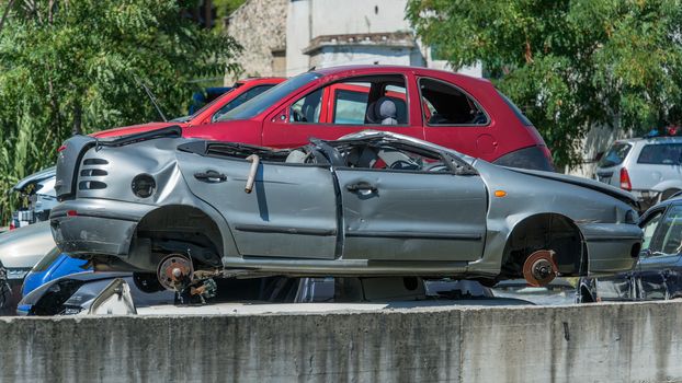 Cars that have finished their lives, are now massed for possible recycling in whole or in part of them.