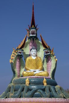 A Buddha Image protected by Nagas (mythical dragon-like creatures) near Monywa in Myanmar (Burma).