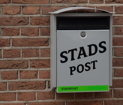 A home delivery mailbox on a wall in The Netherlands