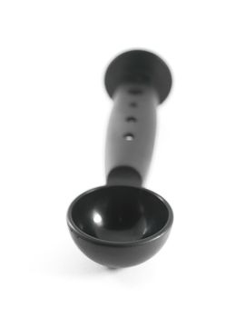 Black plastic coffee scoop isolated