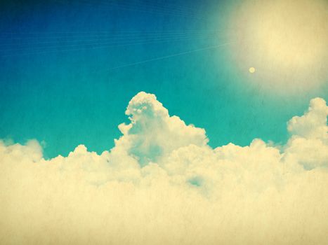 Vintage background in the blue shade with clouds