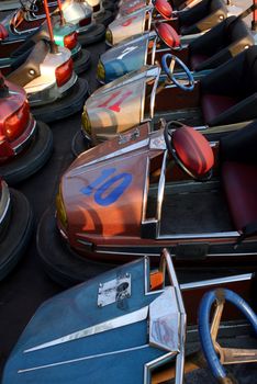 Colorful electric cars in amusement park