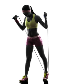one caucasian woman exercising fitness  jumping rope  in silhouette on white background