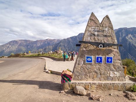 AREQUIPA, PERU - MAR 12: Colca canyon Condor view point on Mar 12, 2011 in Arequipa, Peru. Tourists from around the world arrive this site every day to see the condors flying over the Colca canyon.