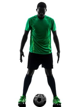 one african man soccer player green jersey standing in silhouette  on white background