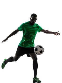 one african man soccer player green jersey kicking in silhouette  on white background