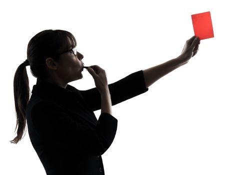 one business woman showing red card  silhouette studio isolated on white background