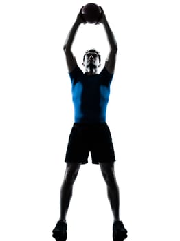 one caucasian man exercising workout holding fitness ball posture in silhouette studio  isolated on white background