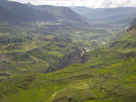 Colca Valley, the colorful Andean valley with pre-Inca roots. Local people maintain their ancestral traditions and continue to cultivate the pre-Inca stepped terraces.