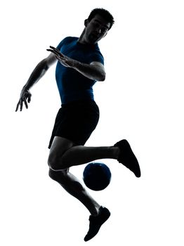 one caucasian man playing soccer football player silhouette  in studio isolated on white background