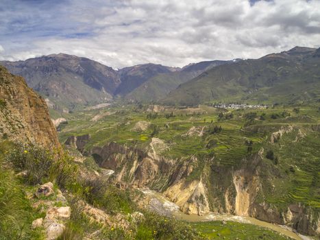 Colca Valley, the colorful Andean valley with pre-Inca roots. Local people maintain their ancestral traditions and continue to cultivate the pre-Inca stepped terraces.