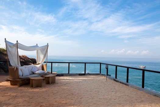 deck chair by the sea in a hotel resort in Kerala state india