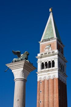 campanile with the lion statue pazzia san marco saint mark square in the beautiful city of venice in italy