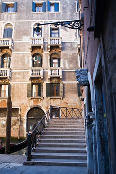 bridge of the small canal in the beautiful city of venice in italy