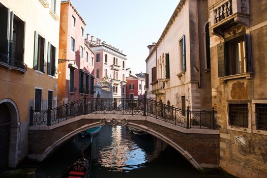 bridge of the small canal in the beautiful city of venice in italy