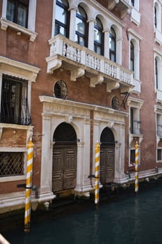 along small canal in the beautiful city of venice in italy