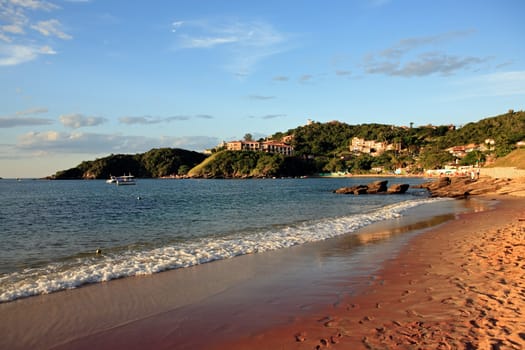 sunset over the praia dos ossos in the beautiful typical brazilian city of buzios near rio de janeiro in brazil