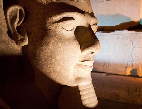 ramessses II statue  of the luxor temple by night in upper egypt