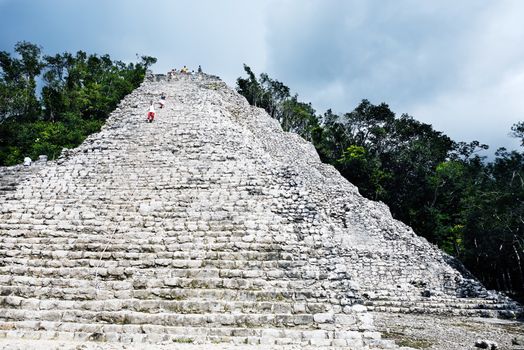 view of the lost in the jungle mayan site of Coba in yucatan mexico