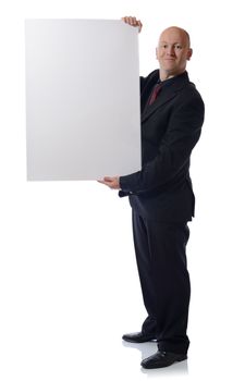 man in suit holding large card advert