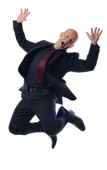 Full length of business man jumping in joy on white background 