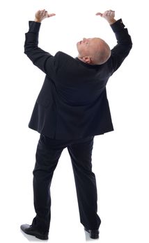 Businessman holding up copy space