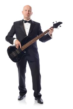 Man in a tuxedo playing bass guitar isolated on white