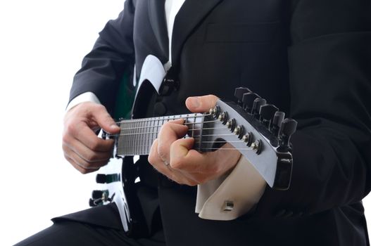 formal man playing guitar isolated on white background 