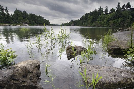 Rocks Formation at Willamette River in Oregon with Stormy Sky