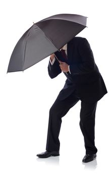 Business man with umbrella isolated on white, concept of facing adversity 