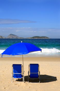 blue deckchair on ipanema beach rio de janeiro brazil