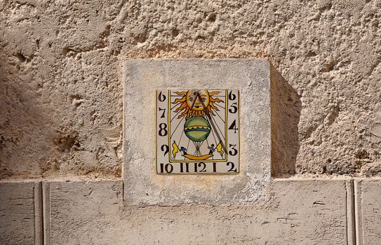 sundial of the typical south east of france old stone village of ramatuelle near saint tropez on the french riviera