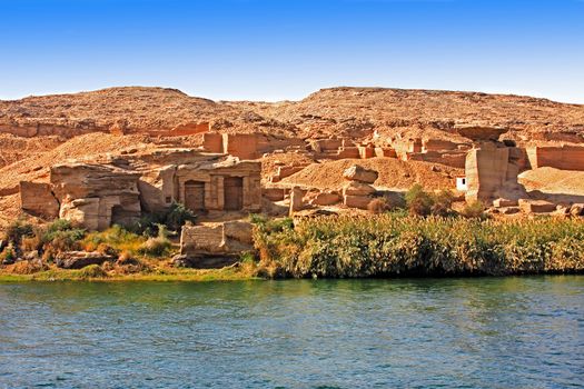Cliff Dwelling troglodytes house on the shore of the river nile in egypt