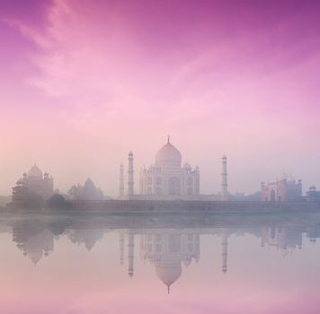 Taj Mahal on sunrise sunset reflection in Yamuna river panorama in fog, Indian Symbol - India travel background. Agra, Uttar Pradesh, India