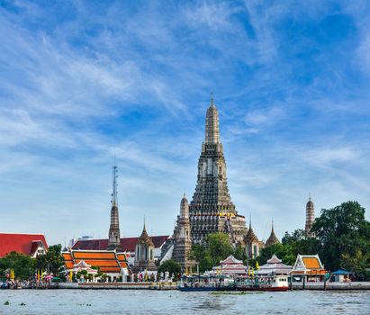 Buddhist temple (wat) Wat Arun on Chao Phraya River. Bangkok, Thailand