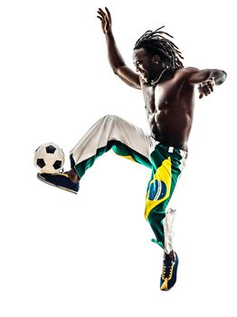 one brazilian  black man soccer player juggling football on white background