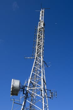 Communication tower with a beautiful blue sky
