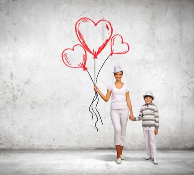 Image of young happy smiling family walking