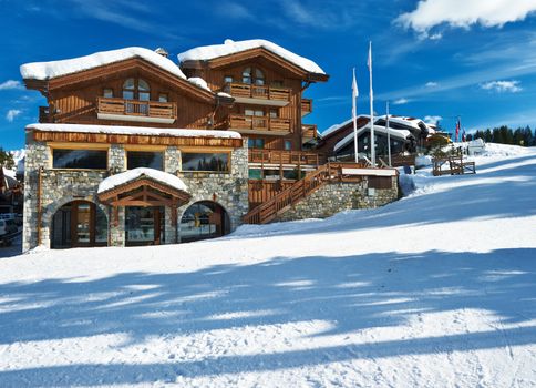 Mountain ski resort with snow in winter, Courchevel, Alps, France